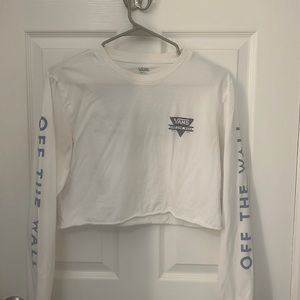 Vans white long sleeved shirt is a size small.